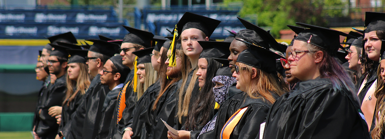 MCC Graduation photo with diverse students